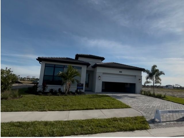 clear blue sky above a newly constructed house at oakbend community in florida