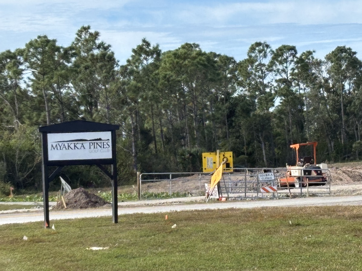 entrance sign to myakka pines golf club which will be a part of the new esplanade wellen park community