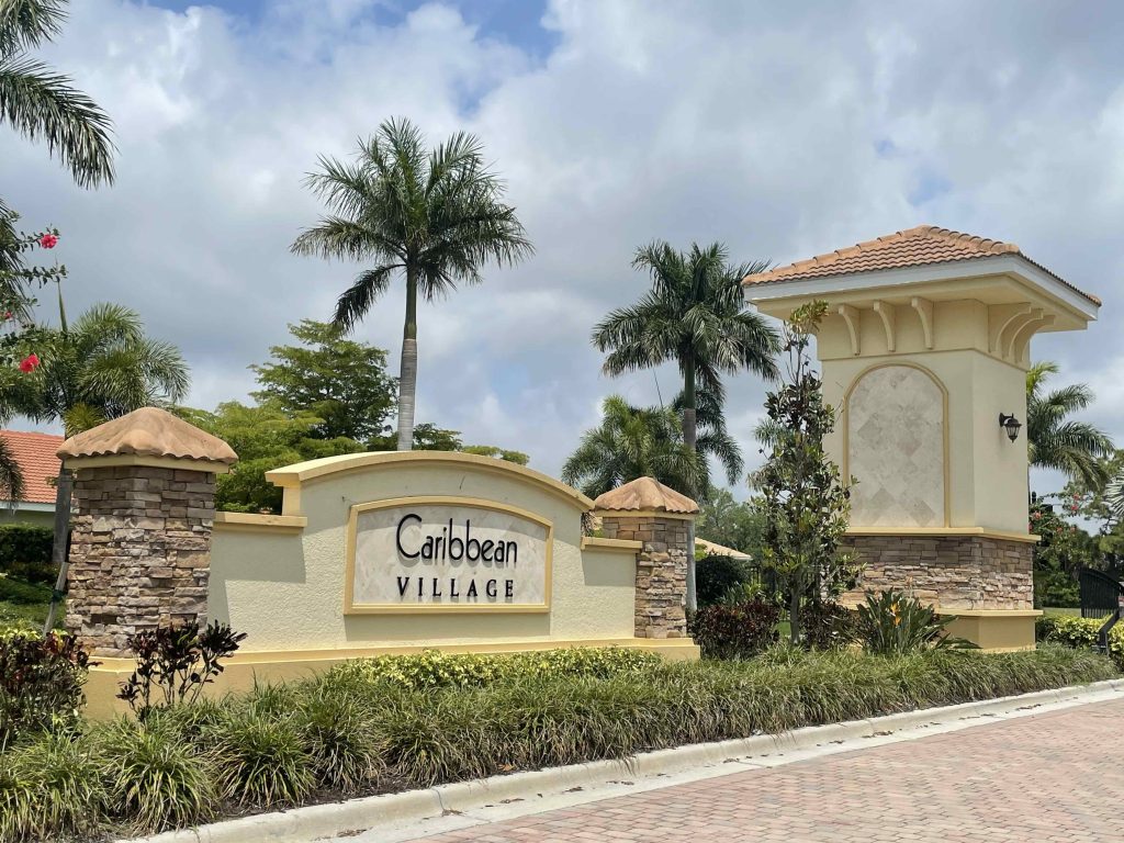 entrance sign to caribbean village - a venice area community with no cdd fees in florida