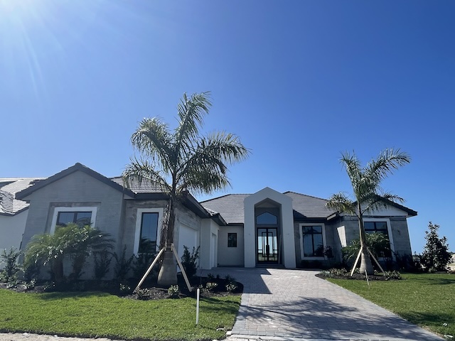 Wellen Park Builders: Your BEST Guide to New Construction Builders & Resale Home Communities 17 front of luxury john cannon homes custom home in wellen park everly community wellen park builders