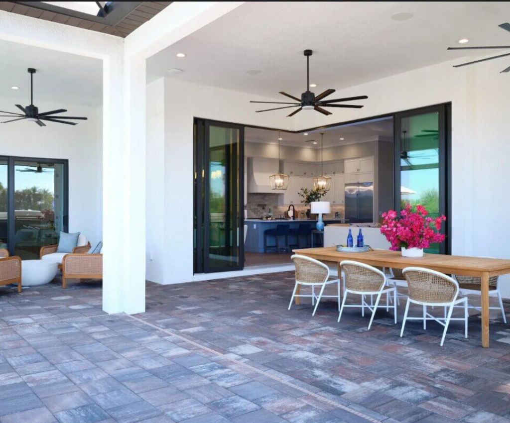 florida outdoor living patio area with stylish furniture and overhead fans